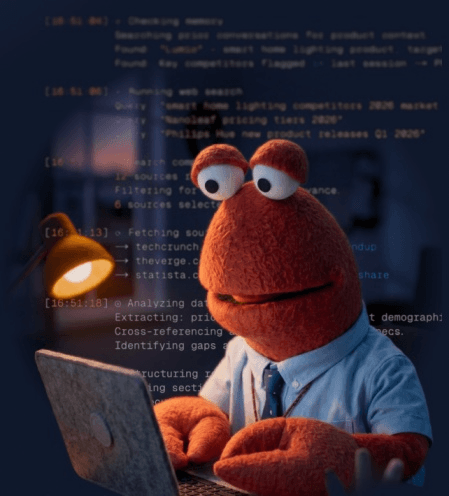 Workmate working at a laptop with terminal logs streaming behind them
