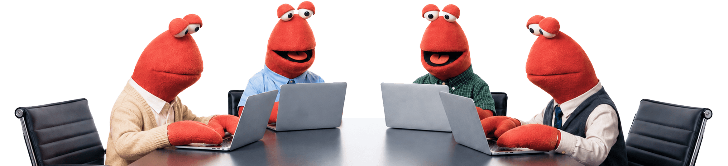 Four Workmates working together at a shared desk